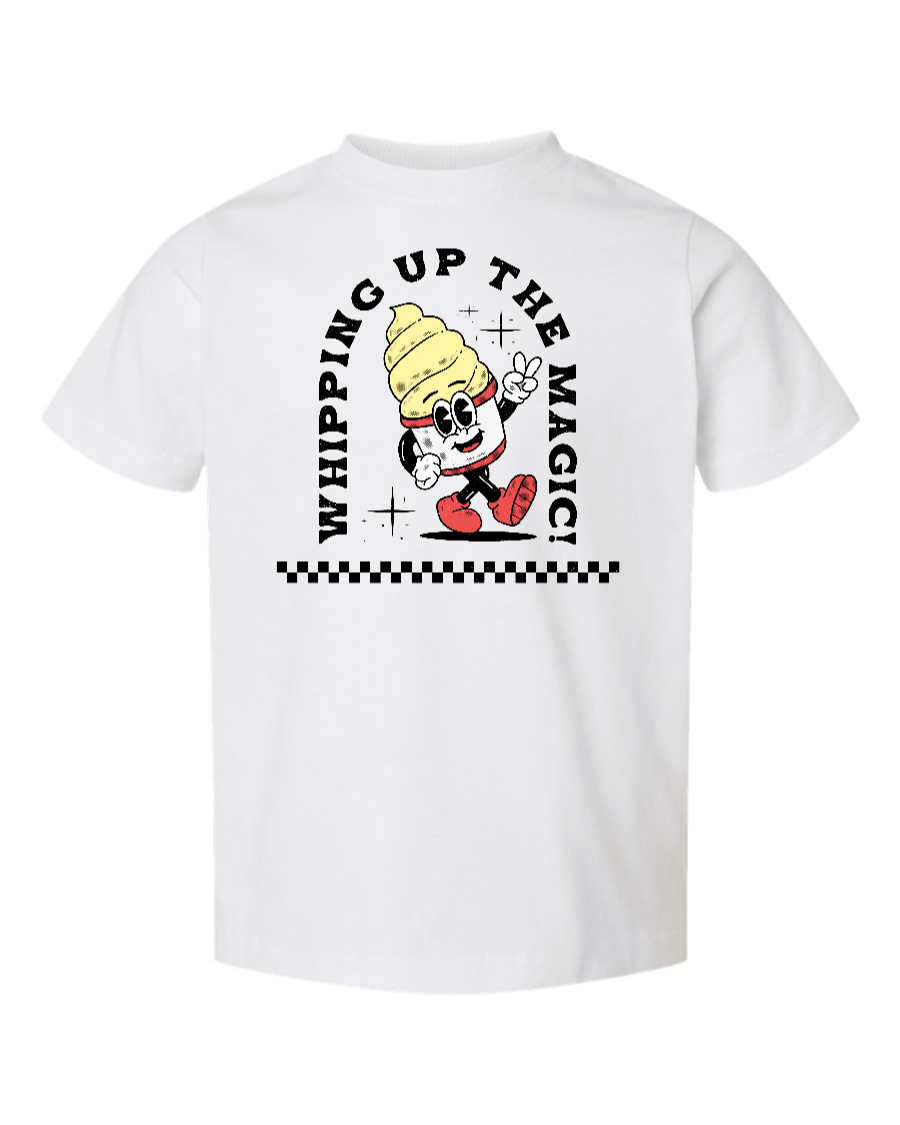 White kids' shirt from Corner of Main's Toddler Whipping Up the Magic collection, featuring playful magic-themed design on front.