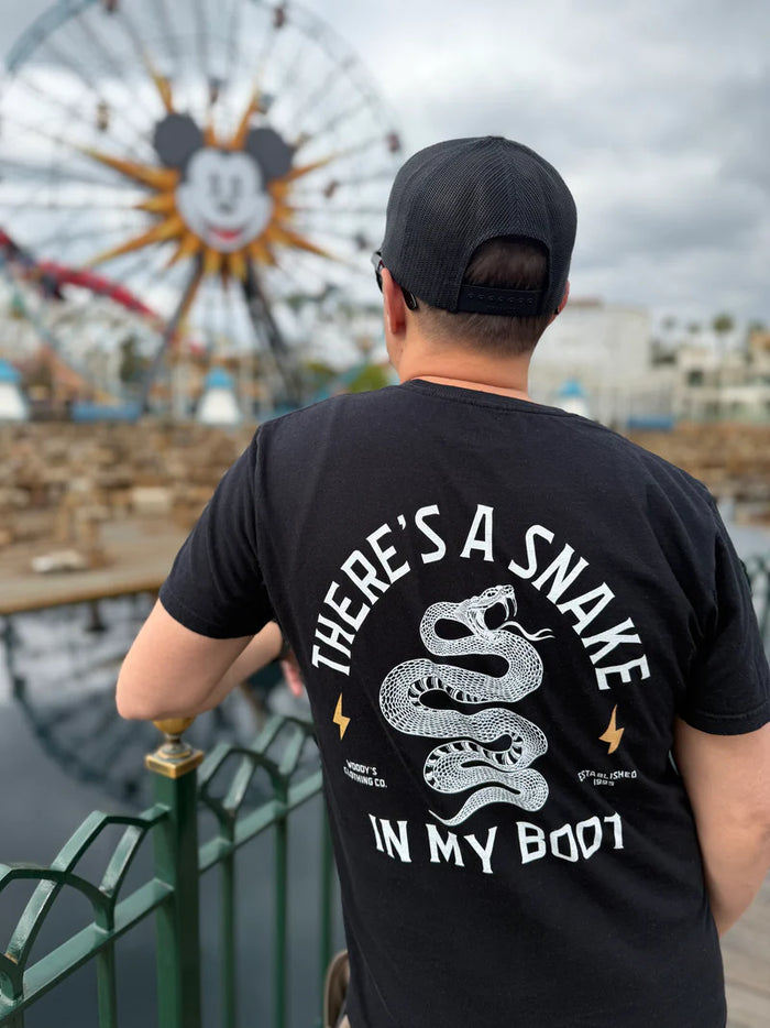 Next Level Snake In My Boot T-Shirt by Corner of Main, featuring a graphic print of a snake inside a boot on soft fabric.