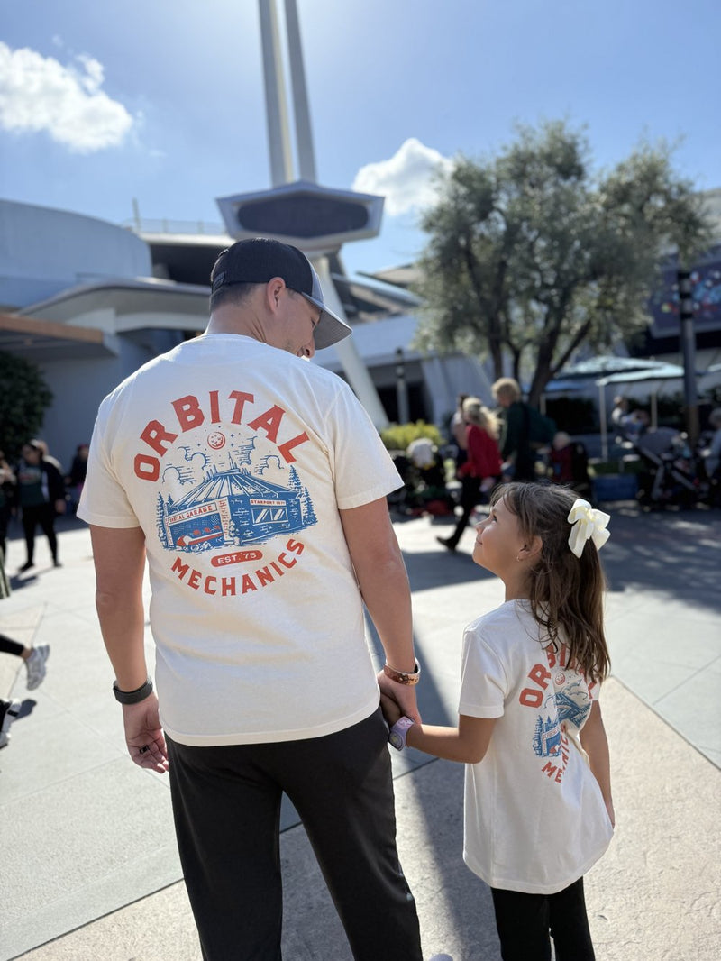 Our family at the park in matching Corner of Main tees