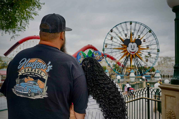 Customer wearing the Hudson's Garage tee at Pixar Pier