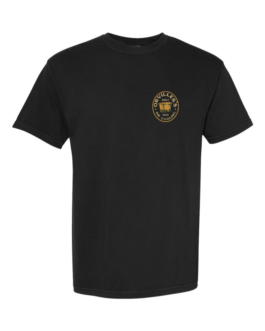 Black Corner of Main T-shirt featuring Orville's Air Cooling Carousel of Progress graphic on the left chest, made of 100% cotton.