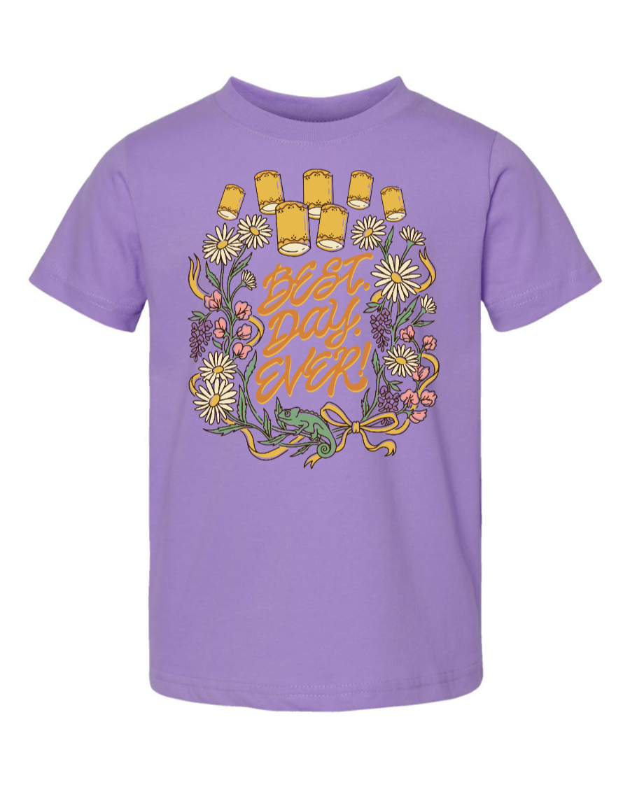 Lavender toddler T-shirt from Corner of Main with "Best Day Ever" print, featuring a front view of the kids' shirt.