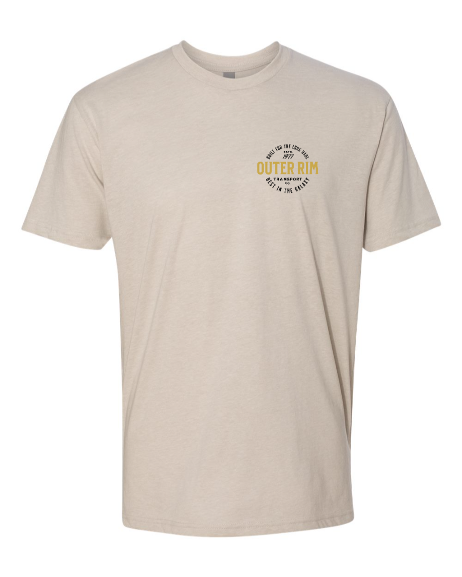 Corner of Main Never Tell Me the Odds T-shirt in sand color, featuring a casual crewneck design with a subtle logo on the left chest.
