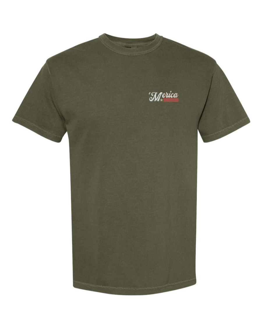 Corner of Main Soarin' Across 'Merica cotton T-shirt in sage with left chest logo, patriotic design, and comfortable fit.