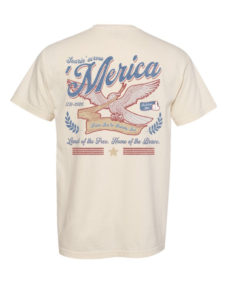Ivory cotton T-shirt featuring patriotic "Soarin' Across 'Merica" design by Corner of Main, shown from the back.