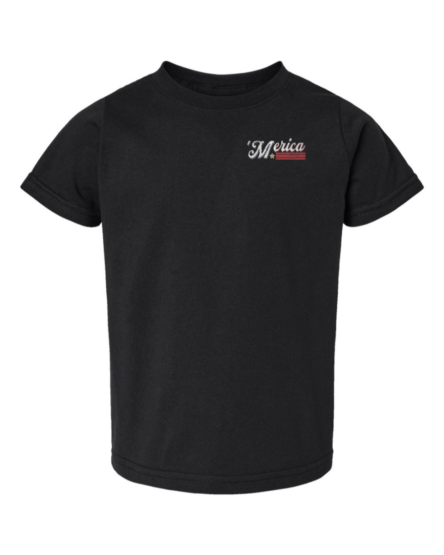 Black toddler kids shirt featuring "Soarin' Across 'Merica" design, by Corner of Main, with patriotic theme on left chest.