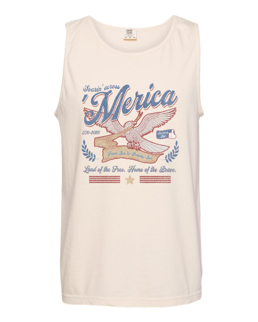 Ivory tank top by Corner of Main featuring patriotic "Soarin' Across 'Merica" design on the front, casual and stylish for summer wear.