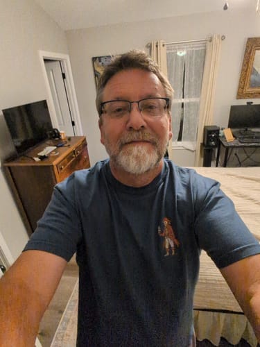 Customer wearing the A Pirate's Coffee Life tee