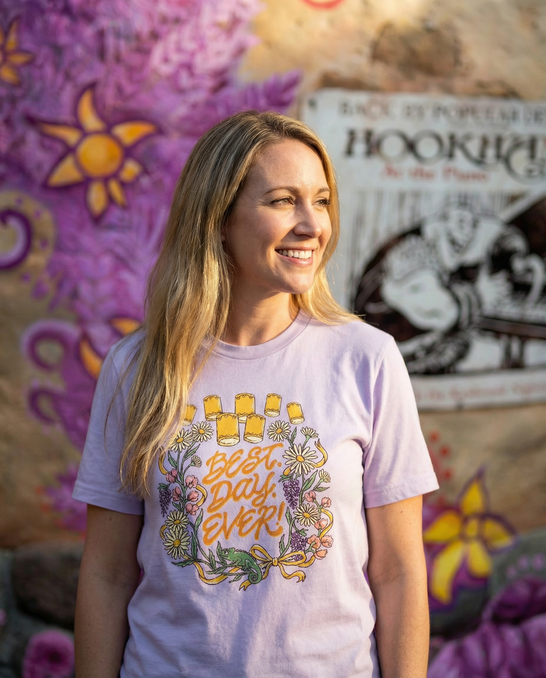 Open image of Corner of Main Best Day Ever! 100% cotton T-shirt with colorful graphic design on front.