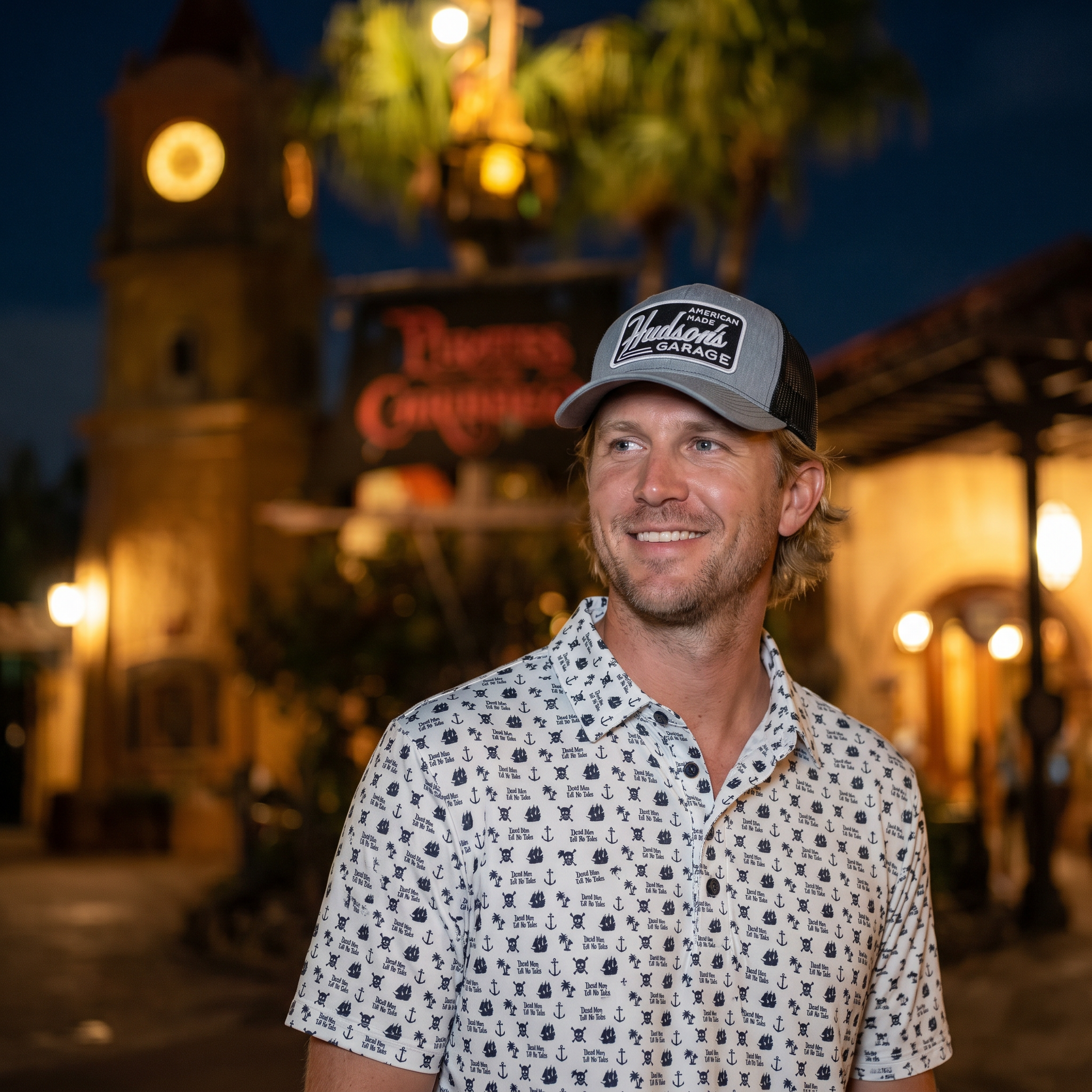 Corner of Main Pirates Polo featuring Dead Men Tell No Tales design, classic polo shirt with nautical-themed print and collar.